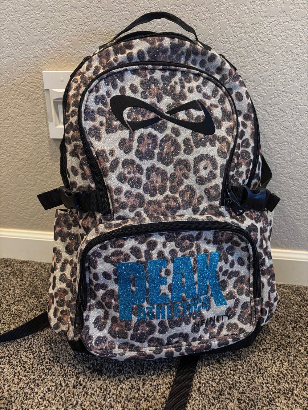 Nfinity Cheetah Print Backpack - "Peak Athletics" Blue Glitter Customization